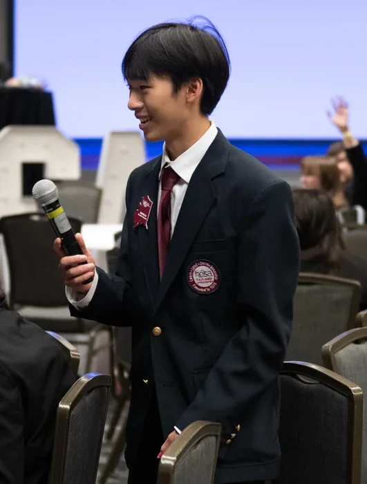 State Officer Kendrew Liu Moderating Assembly